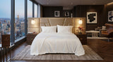 Cotton bed sheet set from the Core Collection featuring breathable cotton comfort, decorative cushion covers, and elegant everyday bedroom styling