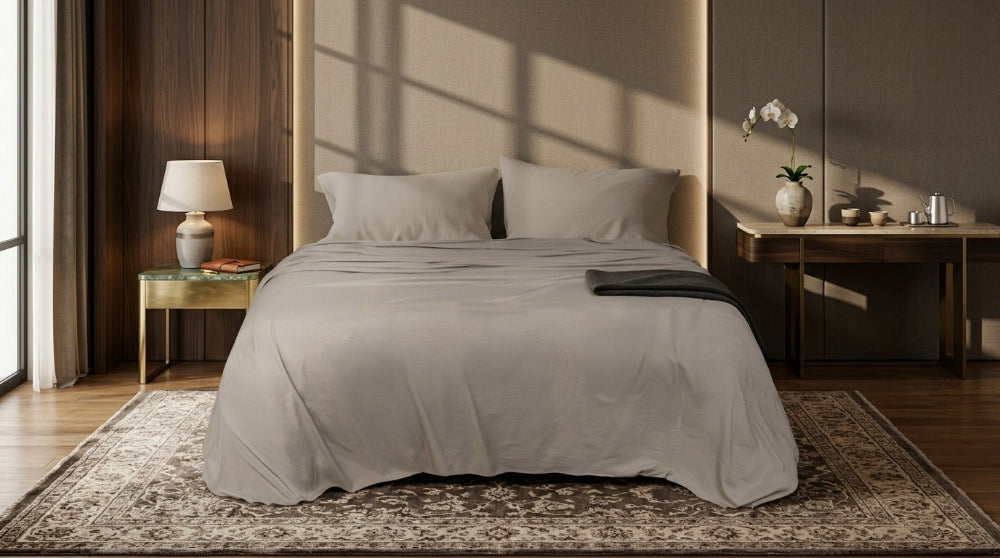 Cotton bed sheet set from the Core Collection featuring breathable cotton comfort, decorative cushion covers, and elegant everyday bedroom styling