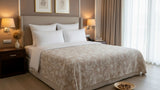 Premium cotton coverlet from the Core Collection styled in an elegant modern bedroom with breathable comfort and timeless neutral décor