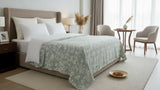 Premium cotton coverlet from the Core Collection styled in an elegant modern bedroom with breathable comfort and timeless neutral décor