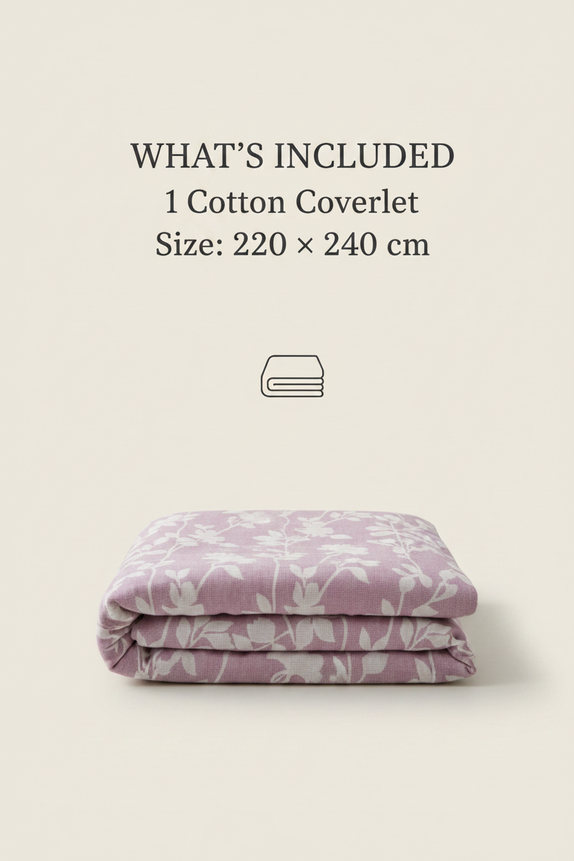 Folded purple cotton coverlet with floral pattern on a beige background