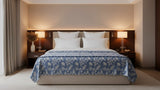 Premium cotton coverlet from the Core Collection styled in an elegant modern bedroom with breathable comfort and timeless neutral décor