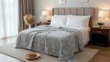 Premium cotton coverlet from the Core Collection styled in an elegant modern bedroom with breathable comfort and timeless neutral décor