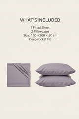 Bedding set with fitted sheet and pillowcases on a beige background