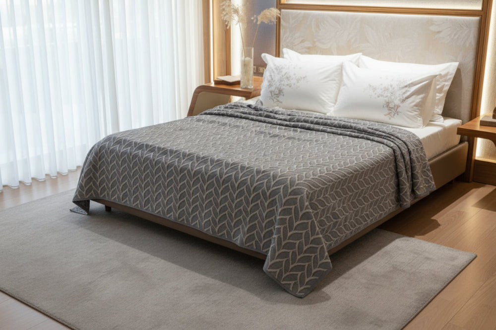 Textured 100% cotton coverlet from the Textures Collection featuring breathable comfort, layered texture, and modern luxury bedroom styling