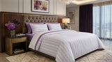 Textured cotton bed sheet set from the Textures Series featuring breathable comfort, decorative cushion covers, and elegant modern bedroom styling