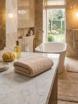 Soft 100% cotton towel from the Core Collection featuring plush absorbent texture and clean luxury bathroom styling