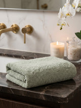Soft 100% cotton towel from the Core Collection featuring plush absorbent texture and clean luxury bathroom styling