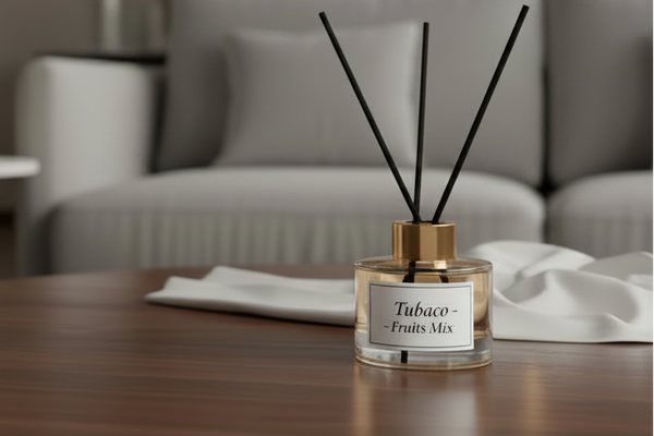 A diffuser bottle on a wooden table in a living room setting.